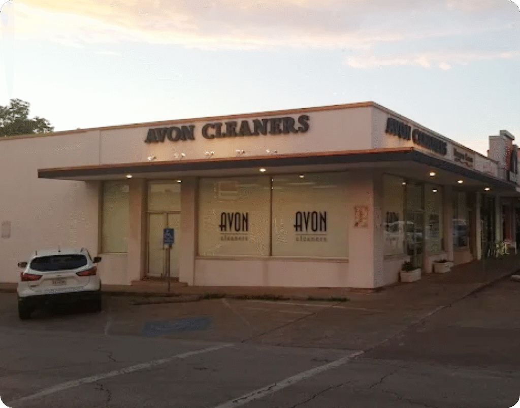 Are Suede or Leather Items Handled in Pickup and Delivery? 1 Avon Cleaners storefront on Hillcrest Avenue in Dallas at dusk
